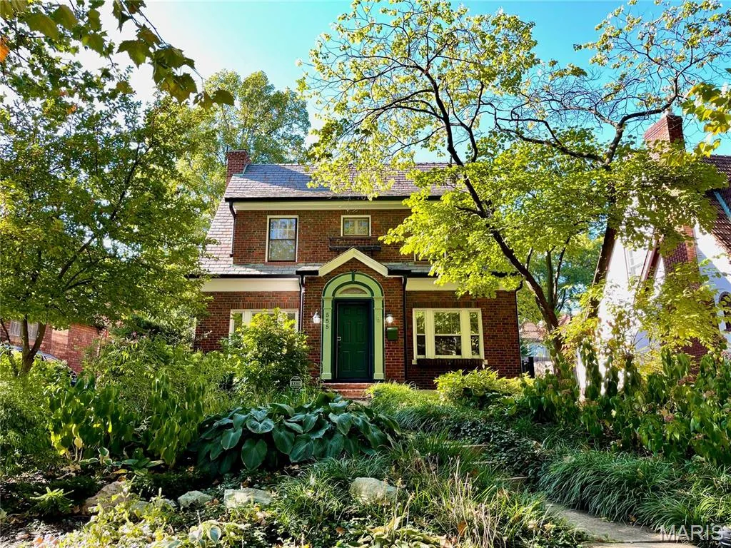 Front exterior of 555 Stratford Avenue, a 1930 brick residence